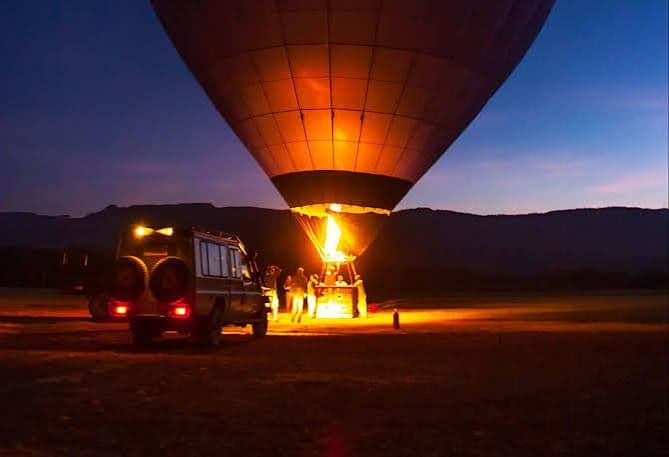 Hot-Air Balloon — Drift above the Mara at first light.